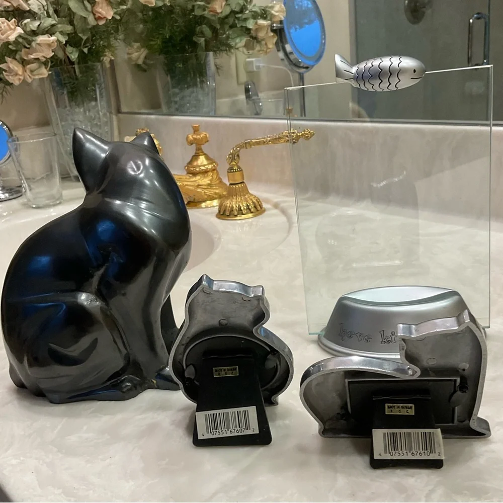 Cat Decor Lot of 4 items, 2 silver and 1 glass photo frames, one black statue